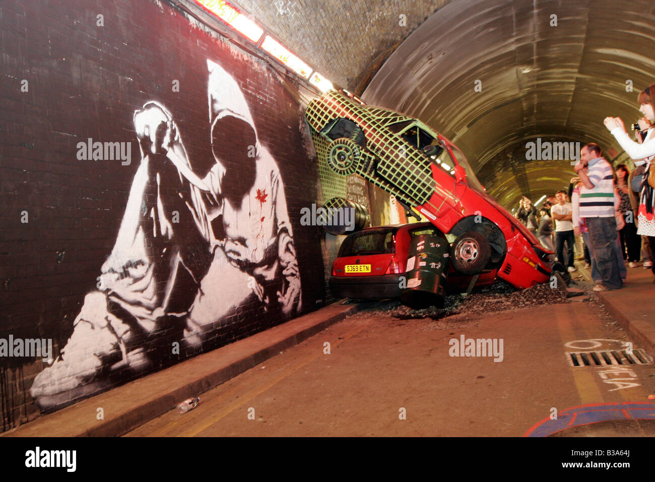 Self Harming Hoodie - Street Art by Banksy at his 2008 Cans Festival in London's Leake St Stock Photo