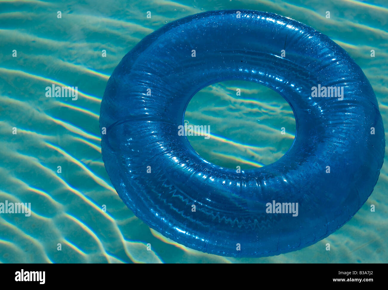 Inflatable ring in a swimming pool Stock Photo - Alamy
