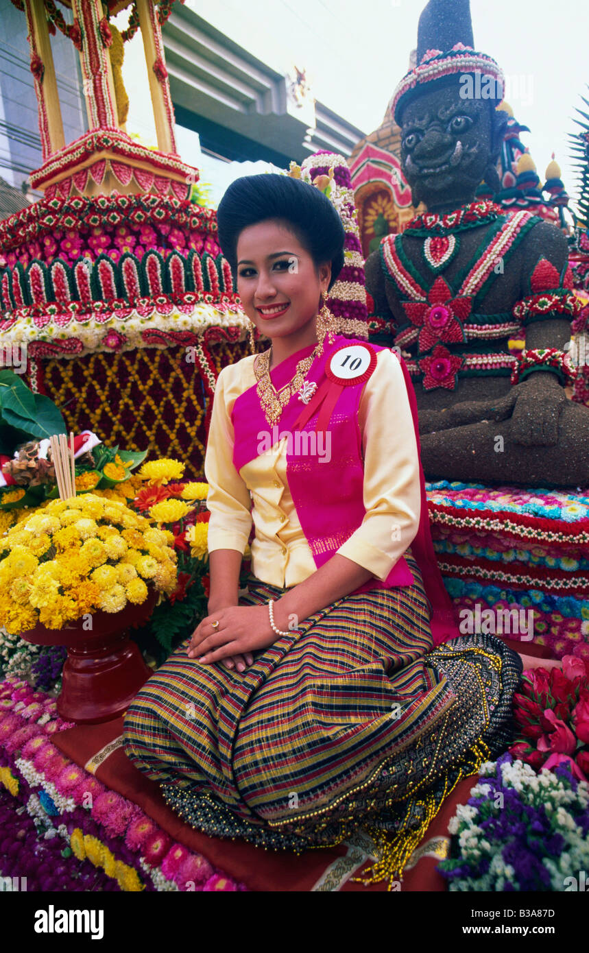 Thailand, Chiang Mai, Girl on Floral Float at Chiang Mai Flower Festival Parade Stock Photo