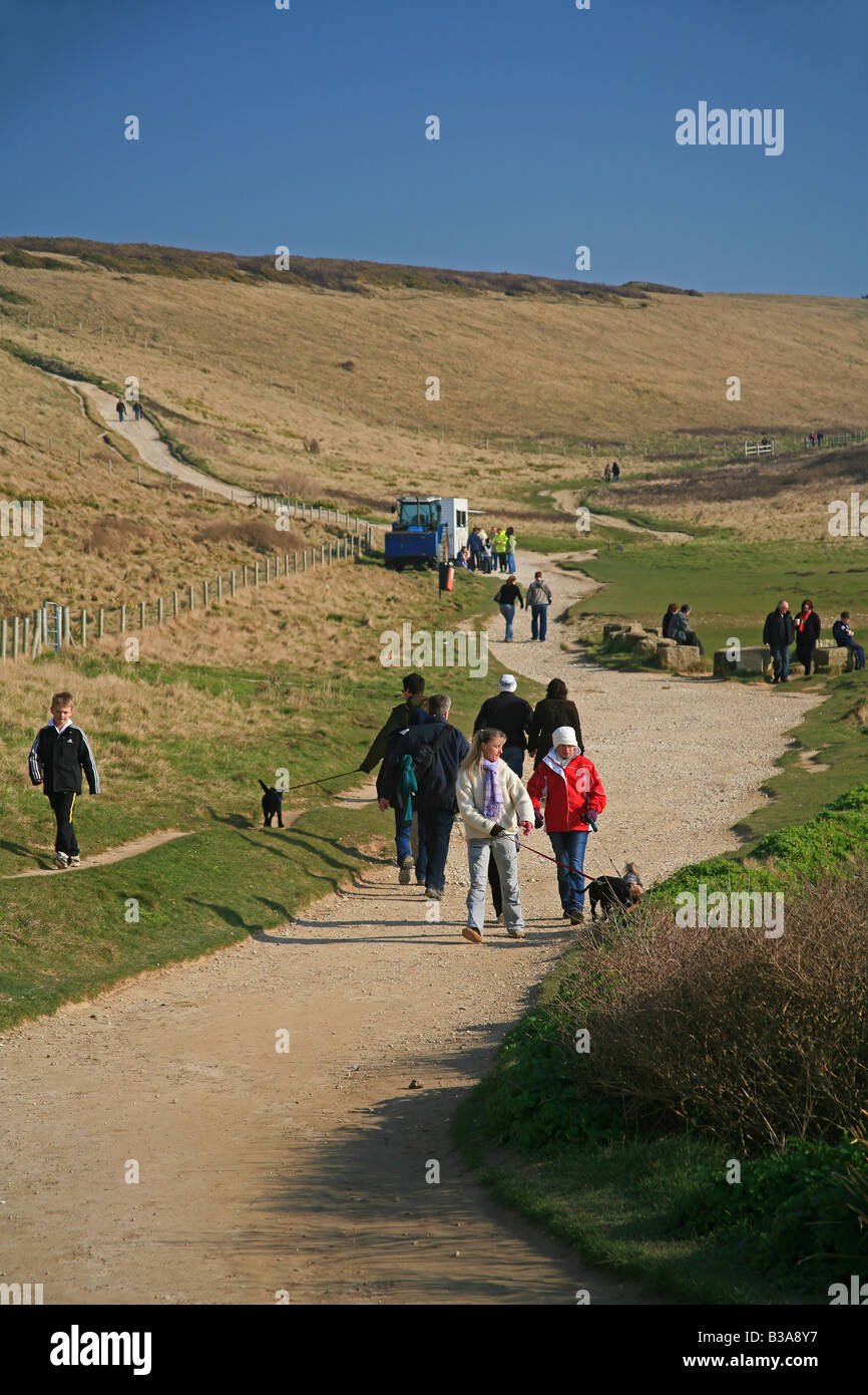 Walkers on the South West Coastal Footpath near Durdle Door, Dorset, England, UK Stock Photo