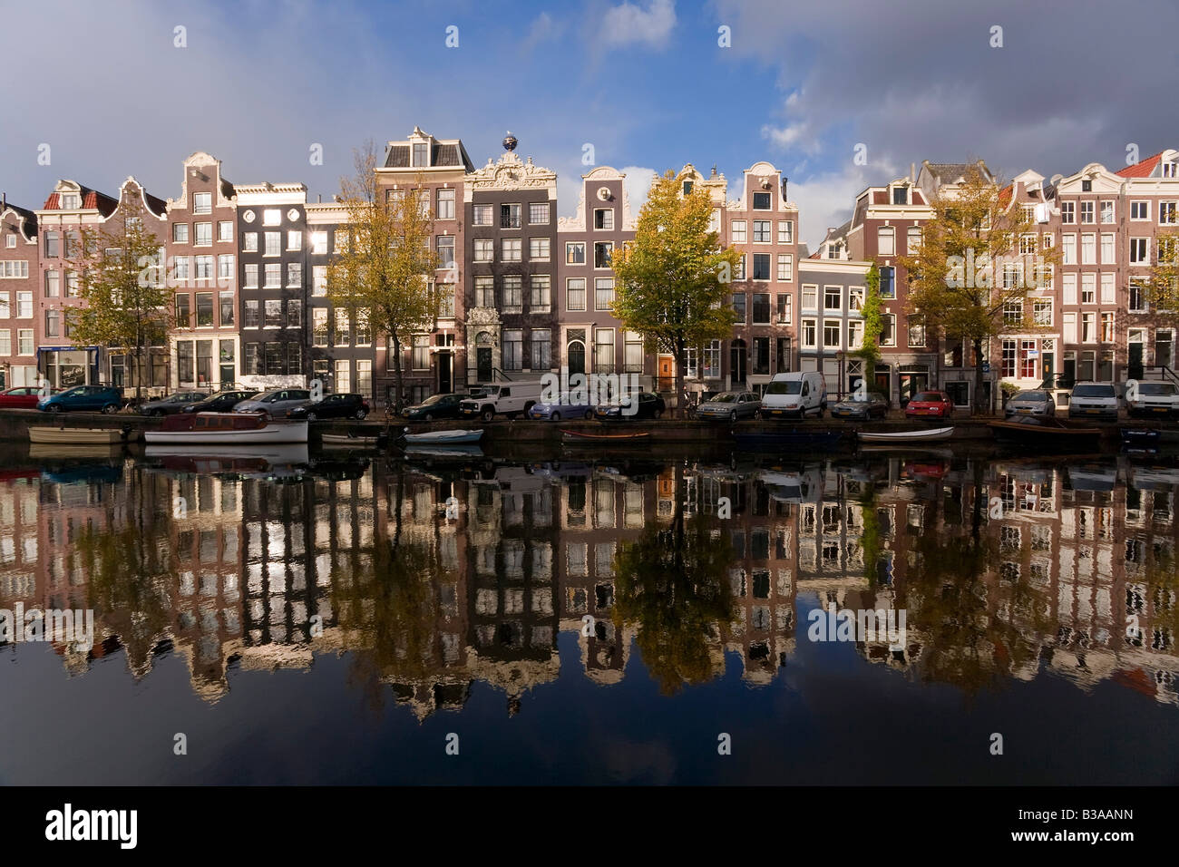 Holland, Amsterdam, traditional Gabled houses and reflections in canal Stock Photo