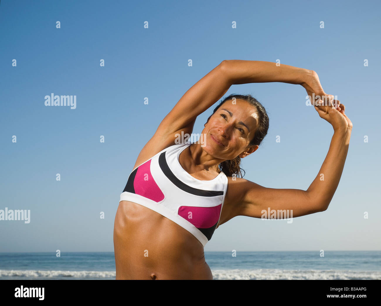 Mature woman beach arms hi-res stock photography and images - Alamy