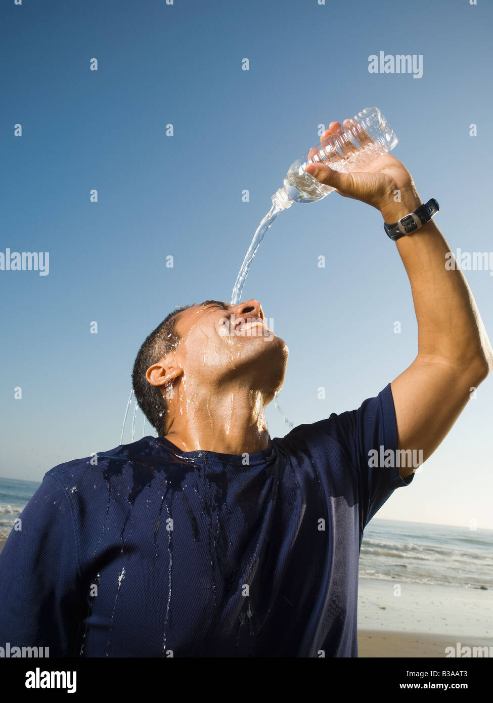 Pouring water over his head hires stock photography and images Alamy