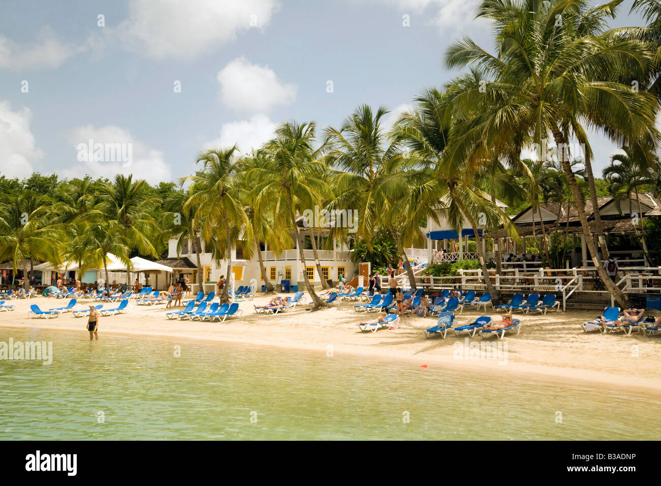 Tourists enjoy the beach, at Windjammer Landing Hotel,  St Lucia, Caribbean, West Indies Stock Photo