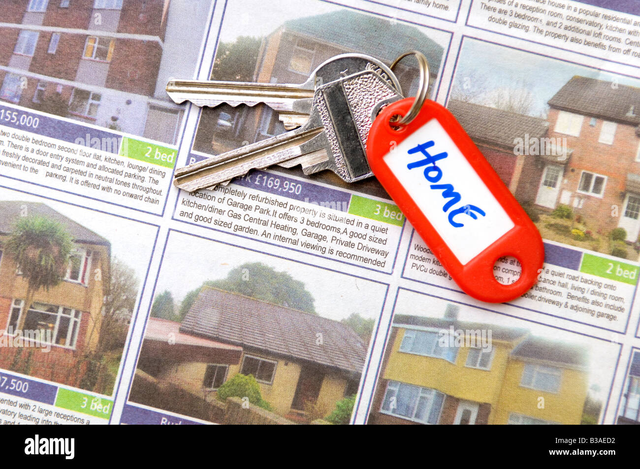 Home keys and property details Stock Photo