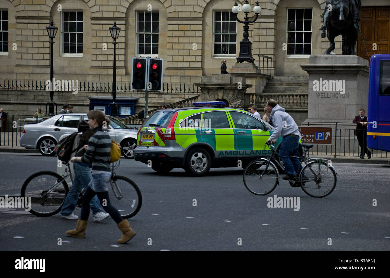 Ambulance vehicle moving through a busy junction, Princes Street, Edinburgh, Scotland, UK, Europe Stock Photo