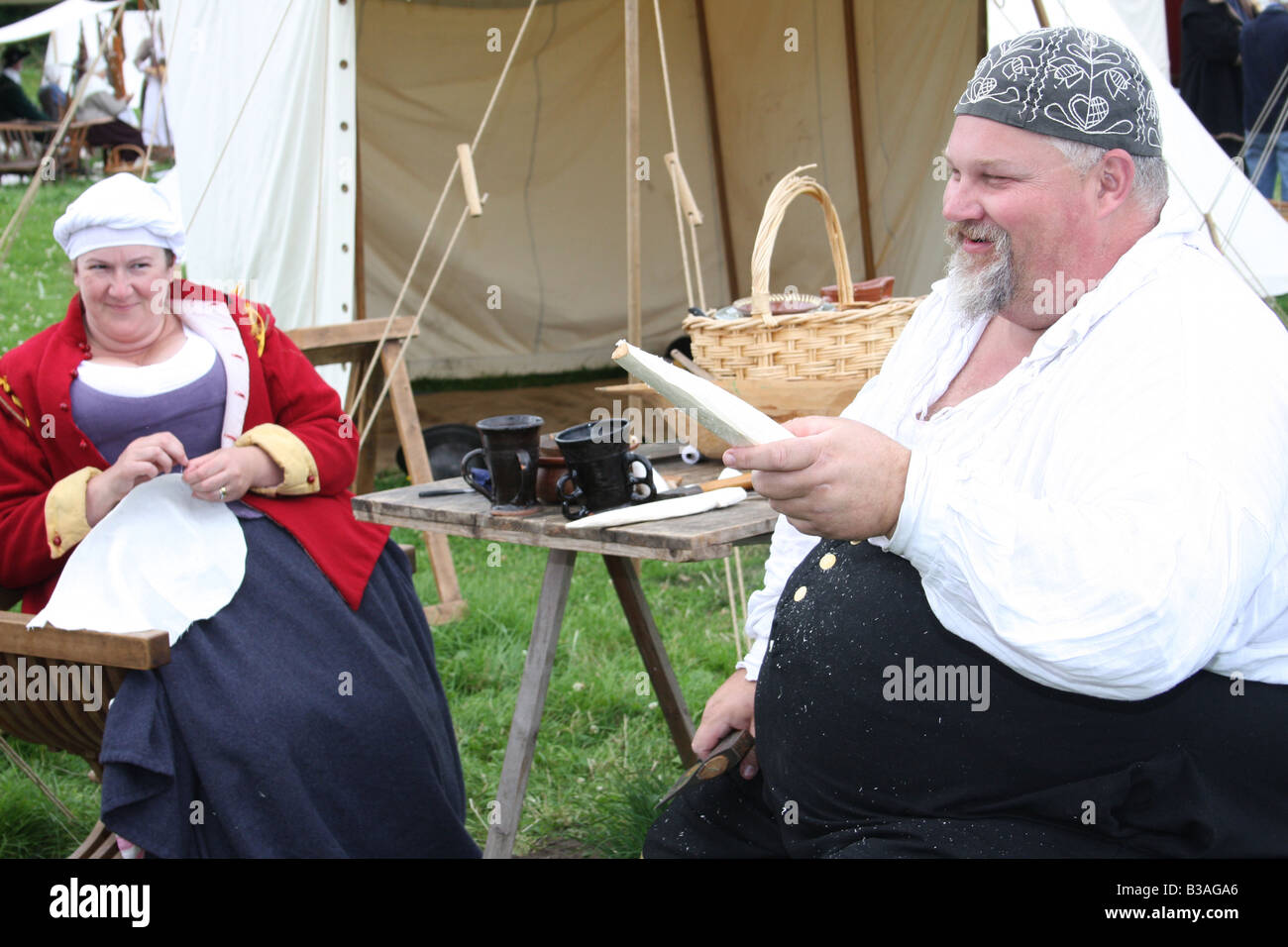 A 17th century English man and woman, at the re enactment of the battle of Faringdon in the English Civil war. Stock Photo