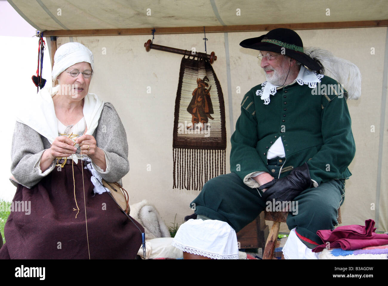 A 17th century English man and woman, at the re enactment of the battle of Faringdon in the English Civil war. Stock Photo