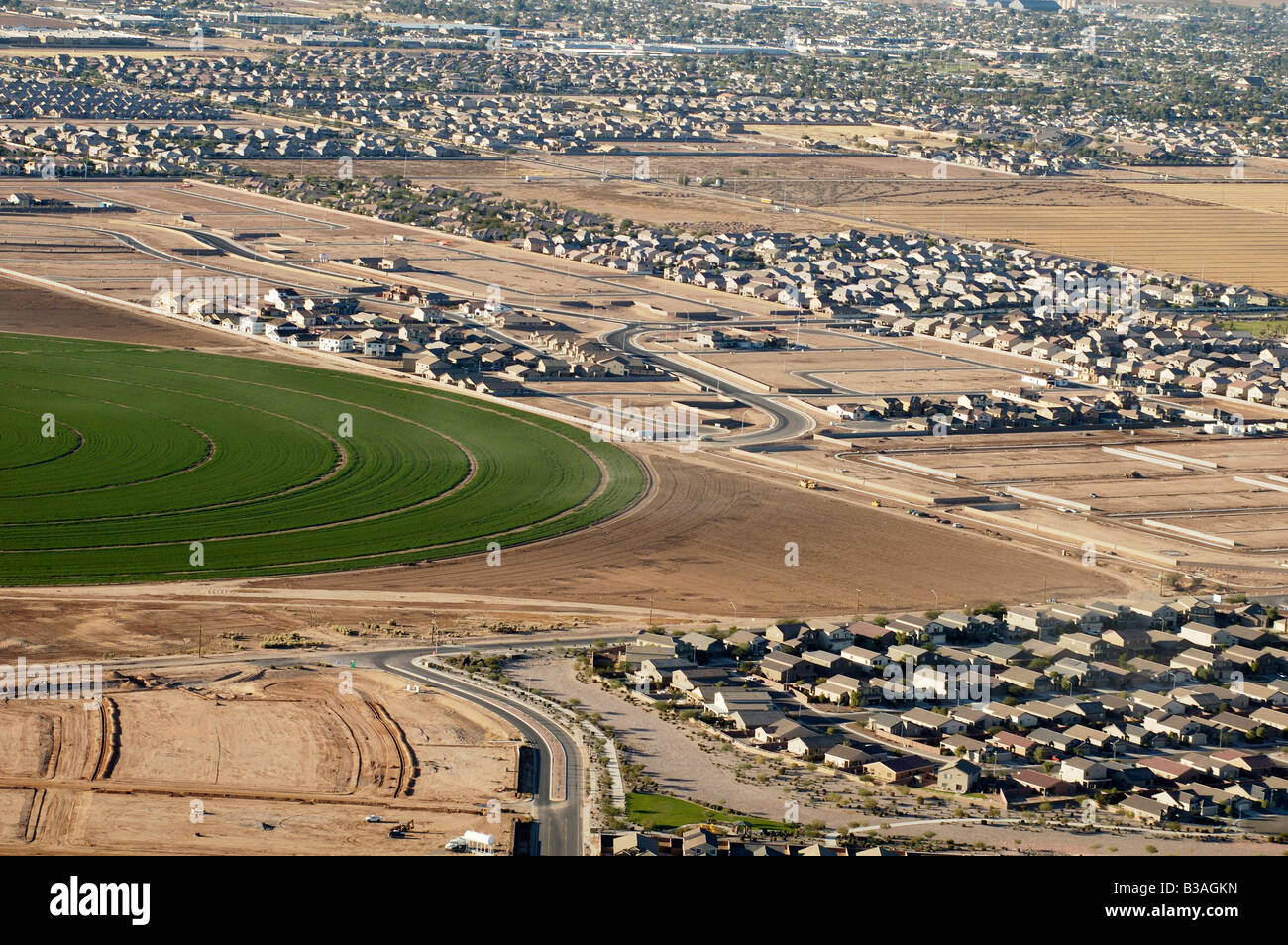 Aerial view of a new housing development on the edge of farm crops near in Casa Grande Arizona Stock Photo