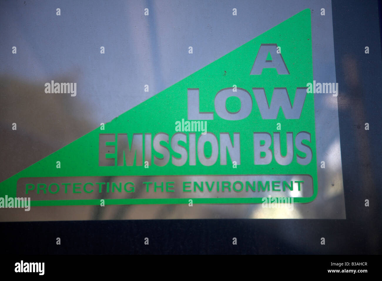 A low emission bus sign in back windscreen glass Stock Photo - Alamy