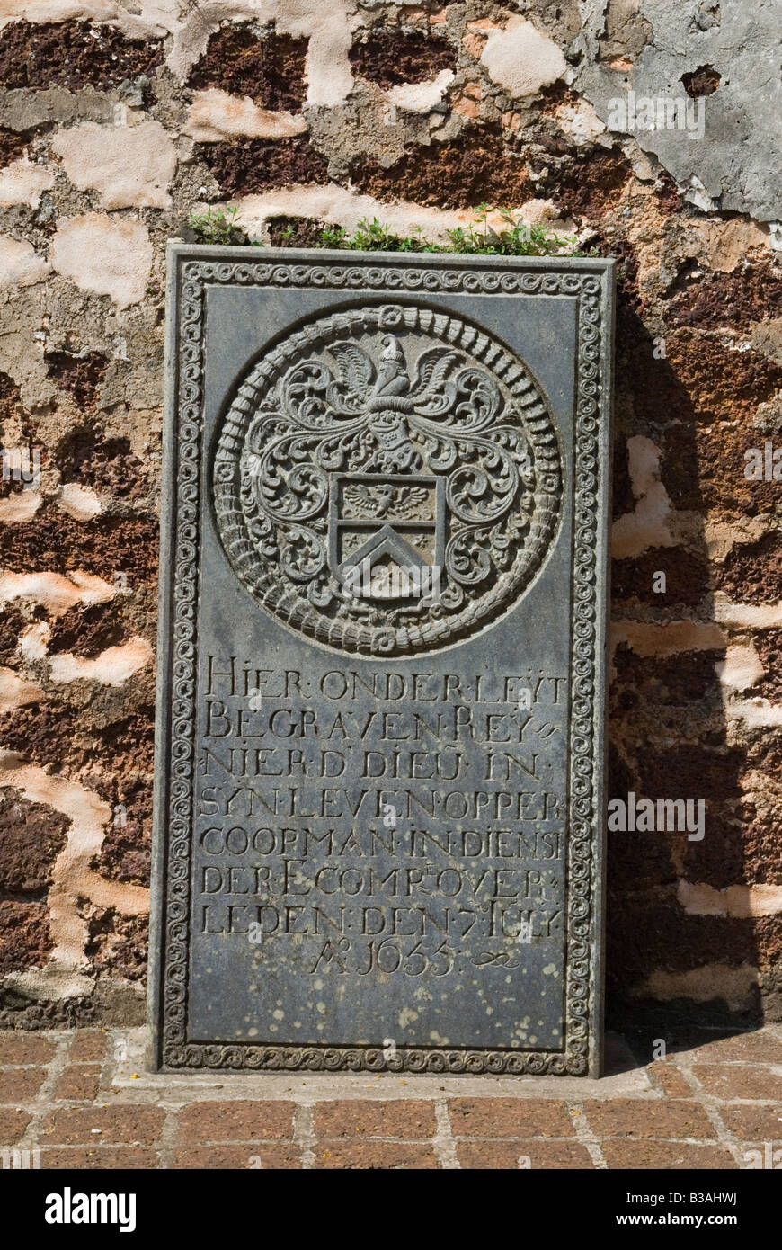 Old Dutch tombstone along the wall of the roofless ruins of the Portuguese built Saint Pauls Church, Bukit St Paul, Malacca, Malaysia Stock Photo