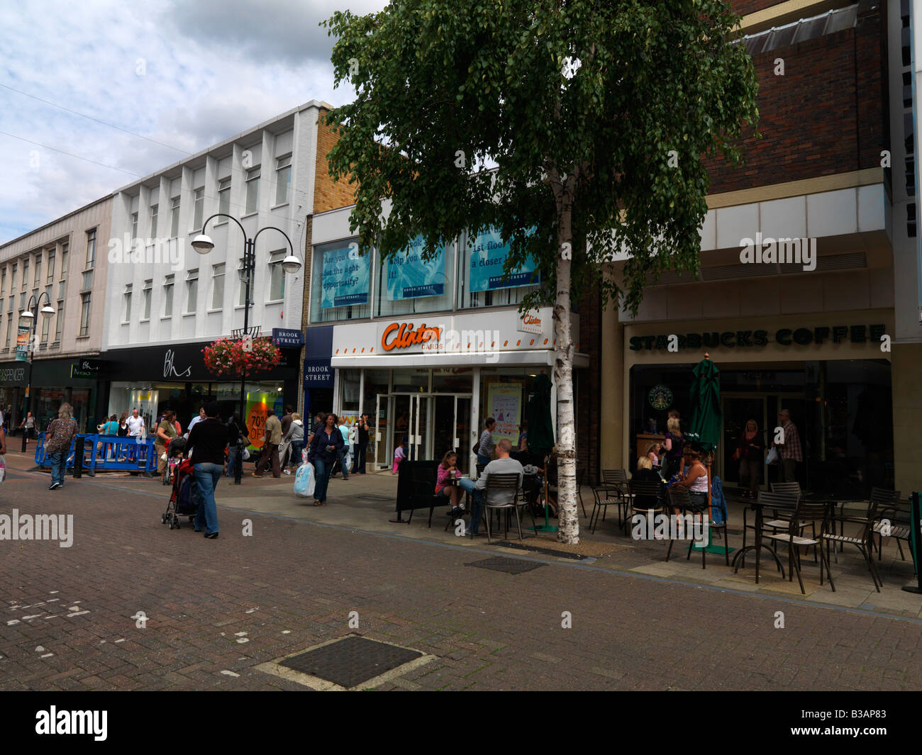 A 1009040 Sutton High Street Showing a Selection of Shops Stock Photo