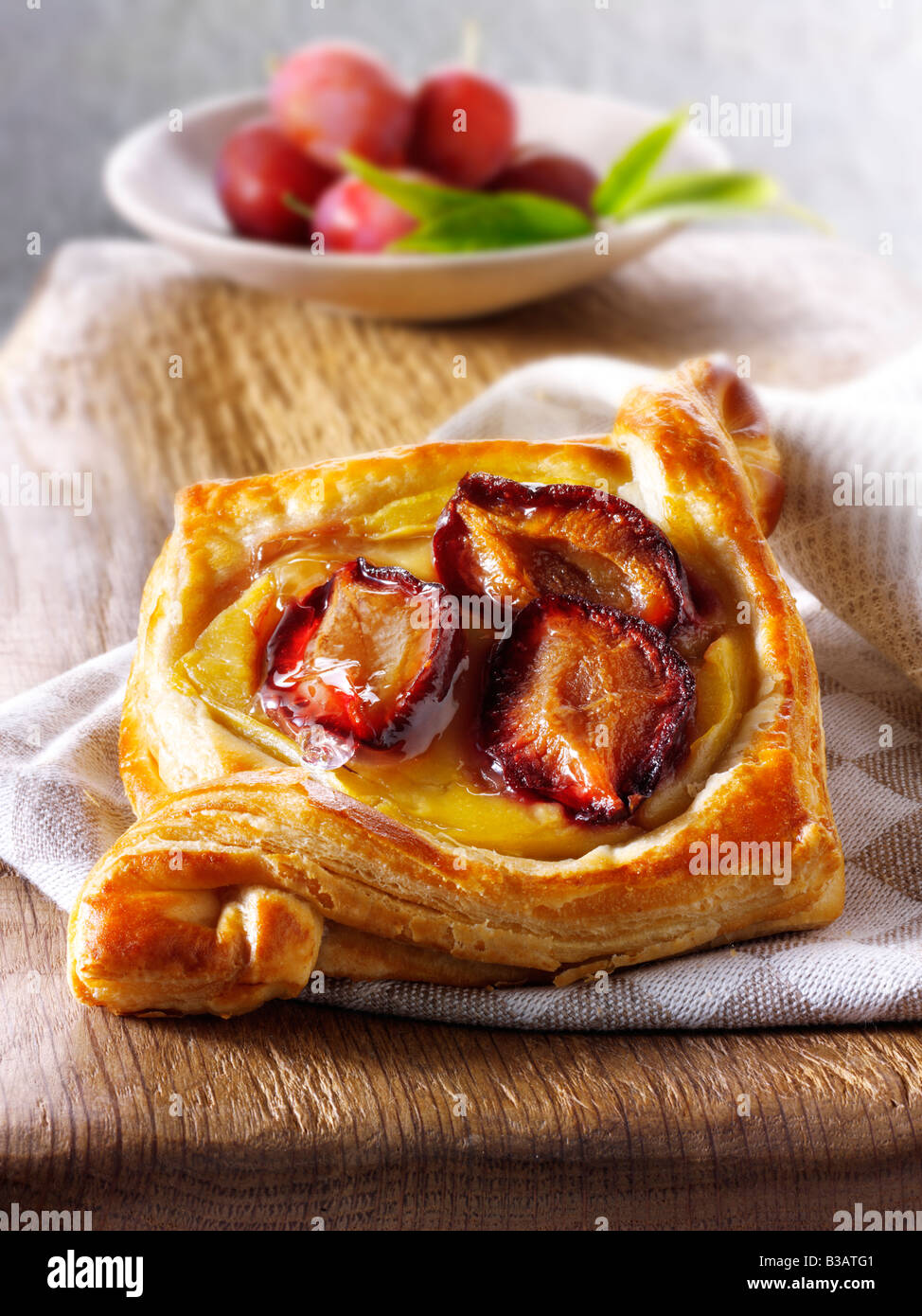 Glazed plum pastry slice Stock Photo
