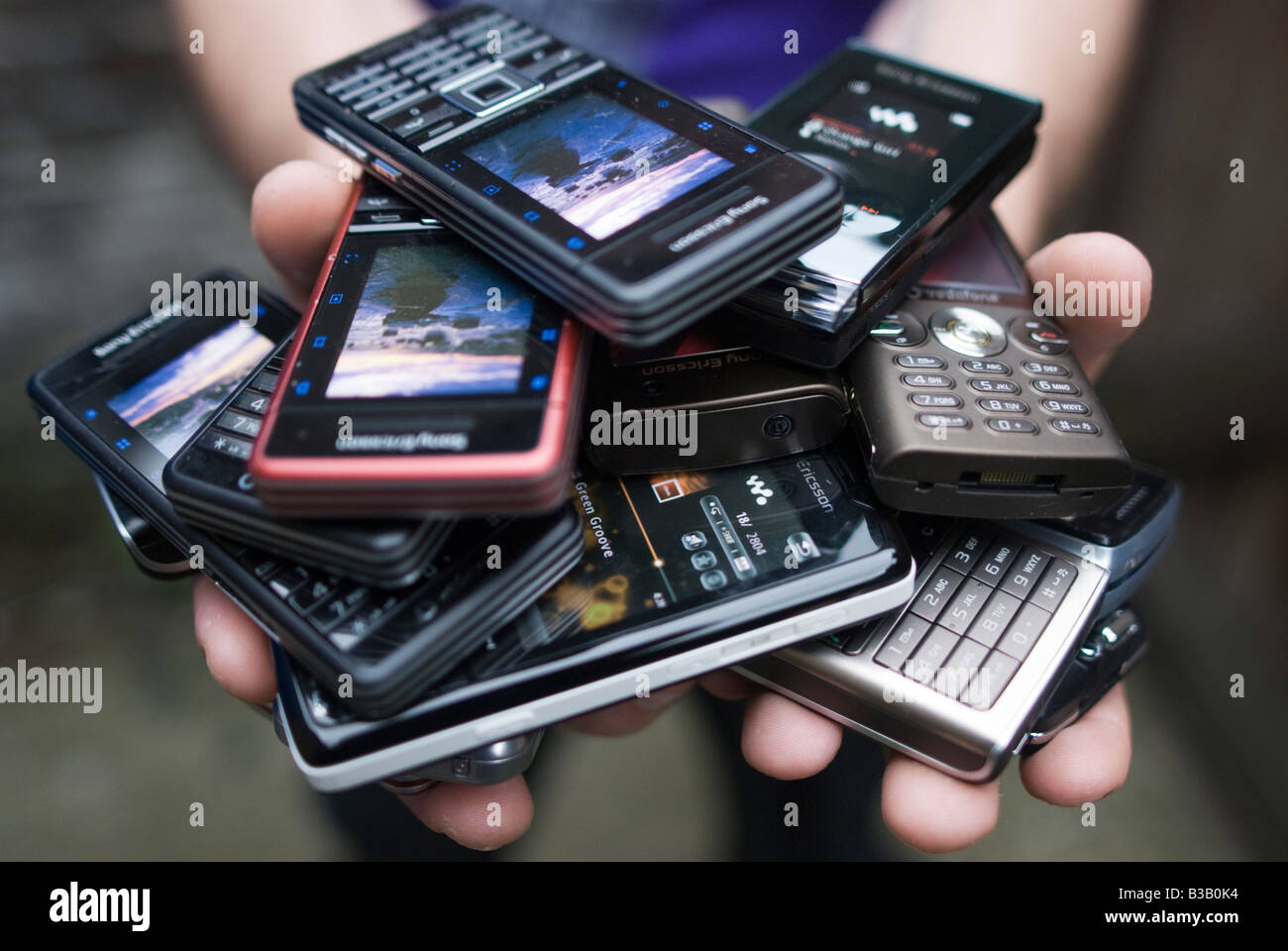 Pile of old   obsolete mobile phones Stock Photo