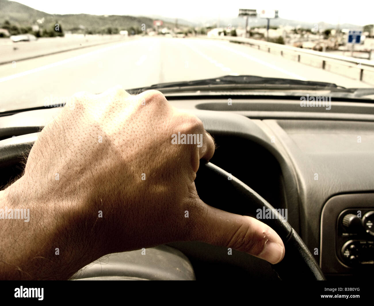 hand in steering wheel driving Stock Photo