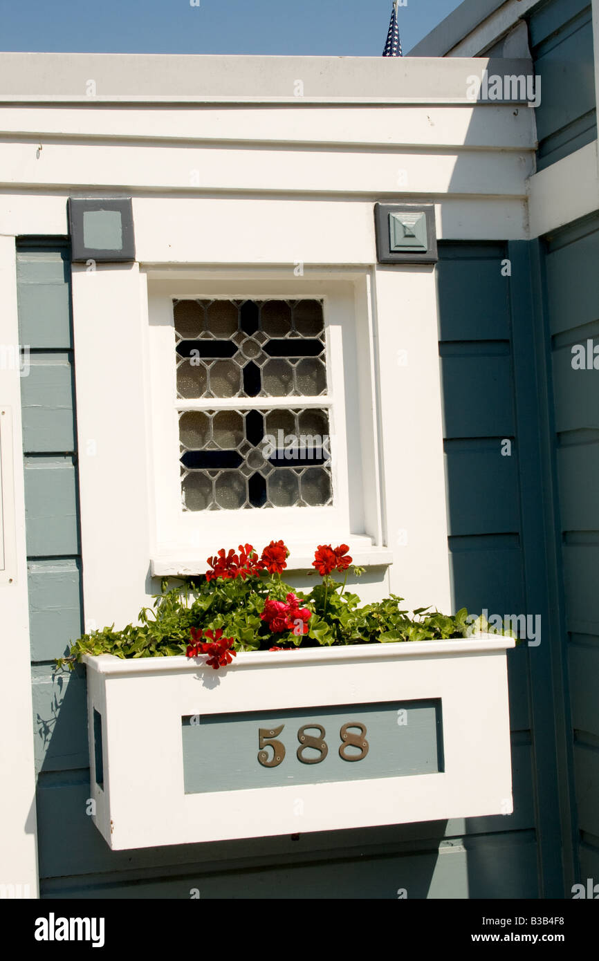 Ornate window with flower box in Tiburon, California Stock Photo