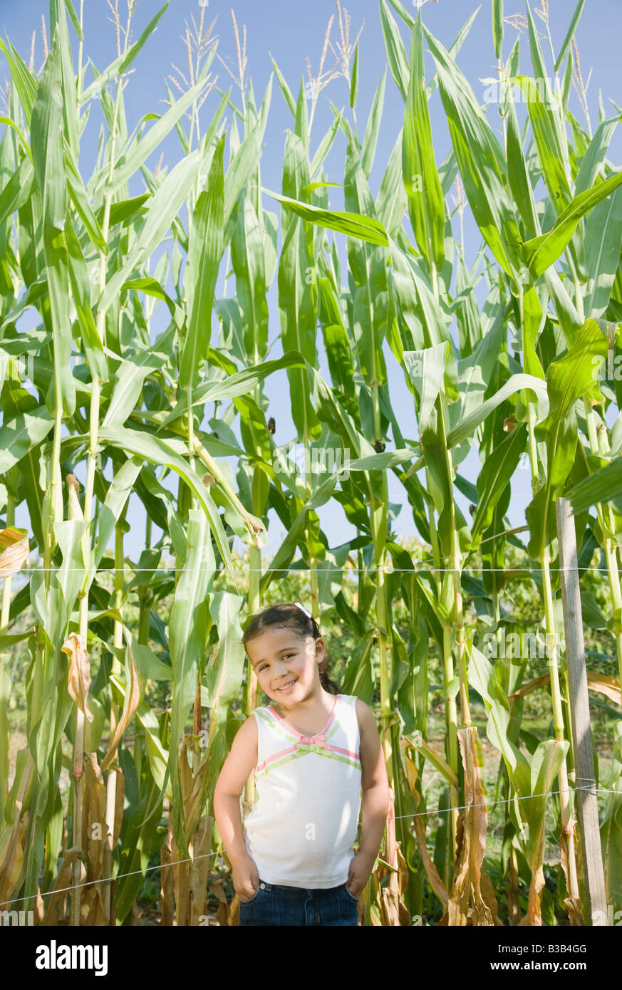 Hispanic girl in front of corn field Stock Photo - Alamy