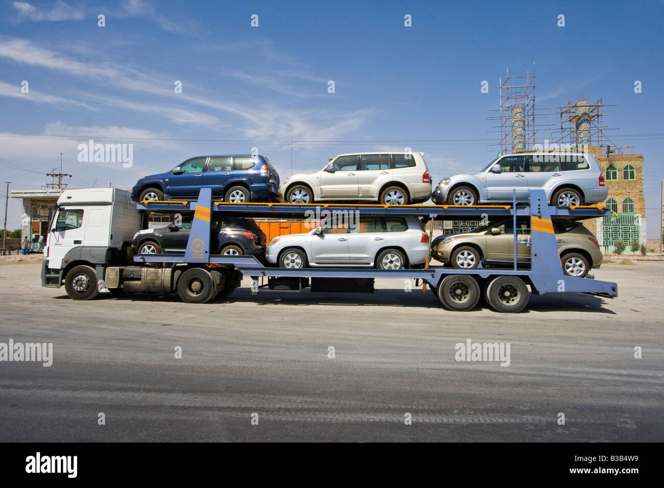New Nissan SUVs Loaded on a Truck Near Yazd Iran Stock Photo