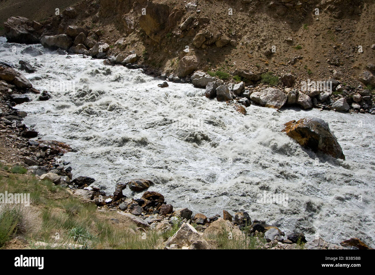 Rushing River in the Panj River Valley Between Afghanistan and Tajikistan Stock Photo