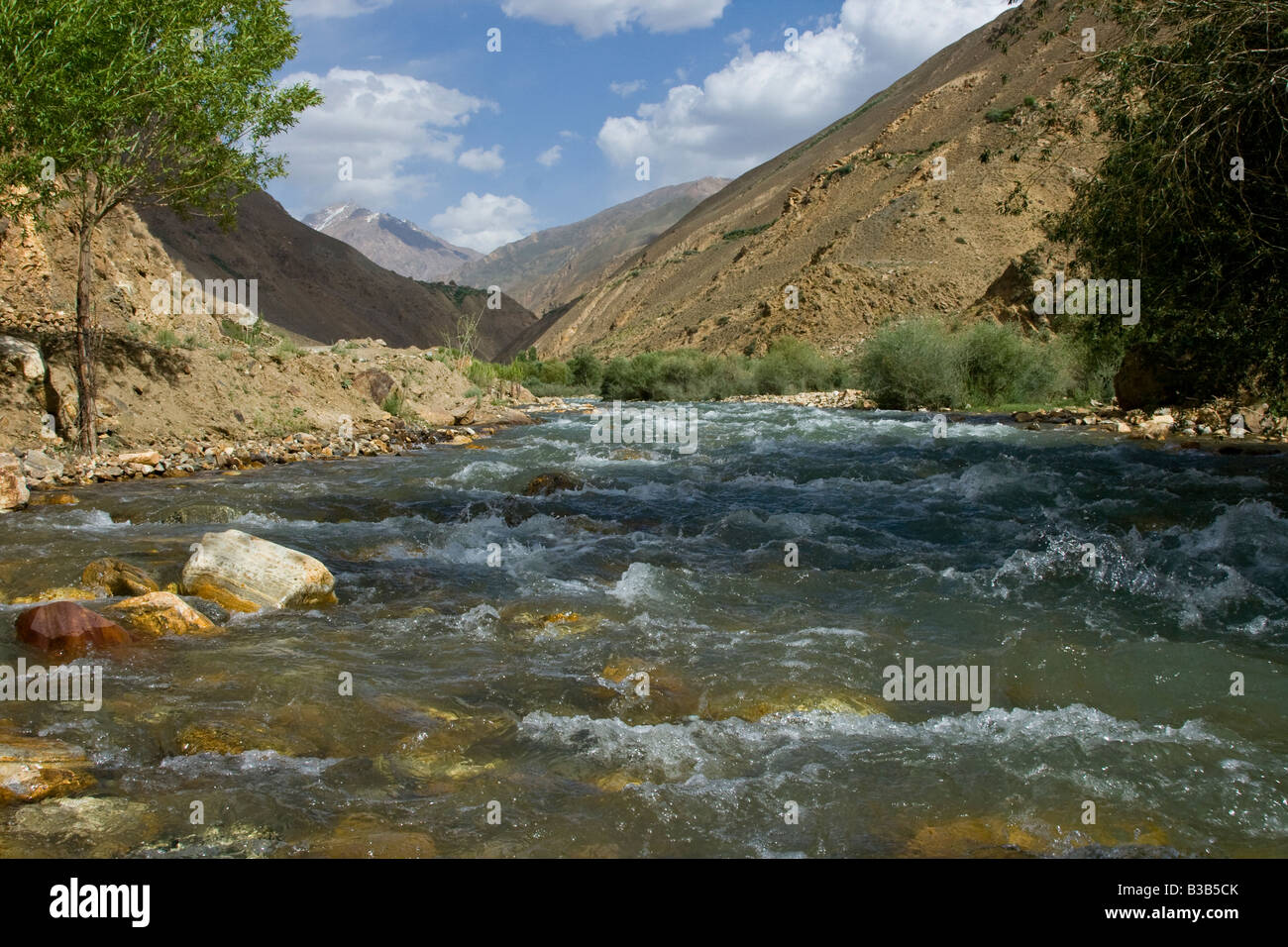 Mountain Stream in the Panj River Valley in the Wakhan Corridor in Tajikistan Stock Photo