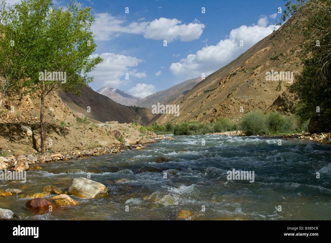 Mountain Stream in the Panj River Valley in the Wakhan Corridor in Tajikistan Stock Photo