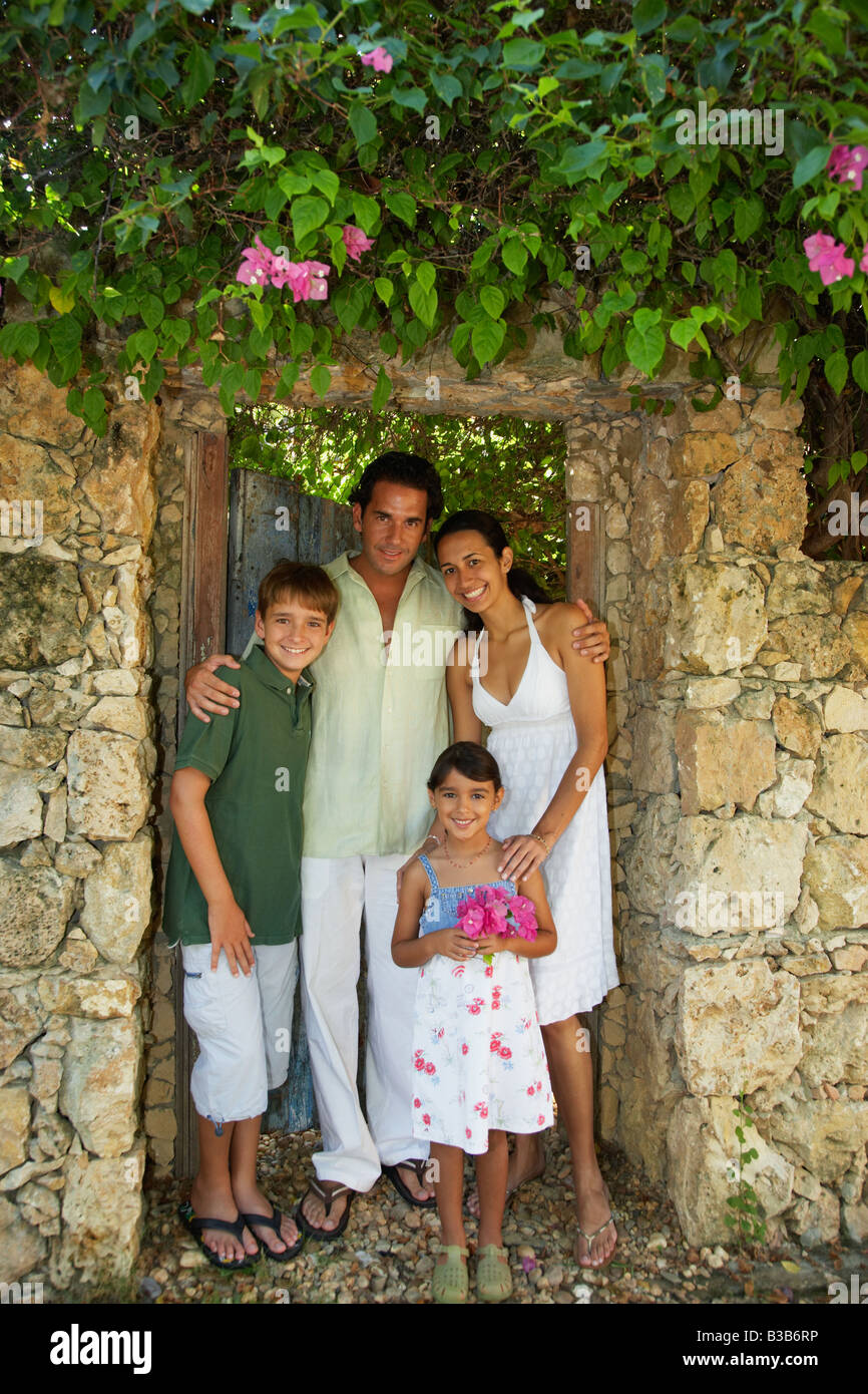 Hispanic family in garden doorway Stock Photo - Alamy