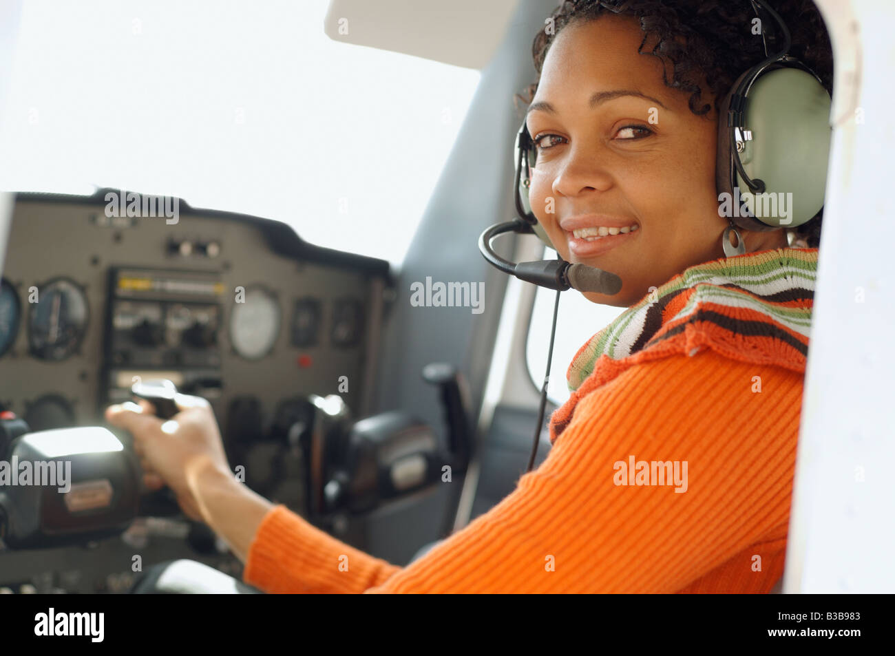 African woman pilot cockpit hi-res stock photography and images - Alamy