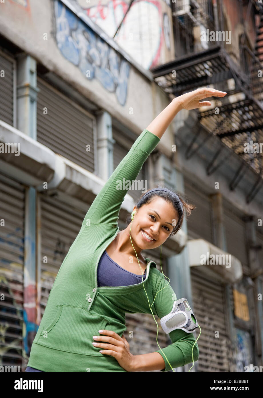 Indian woman stretching arm hi-res stock photography and images - Alamy