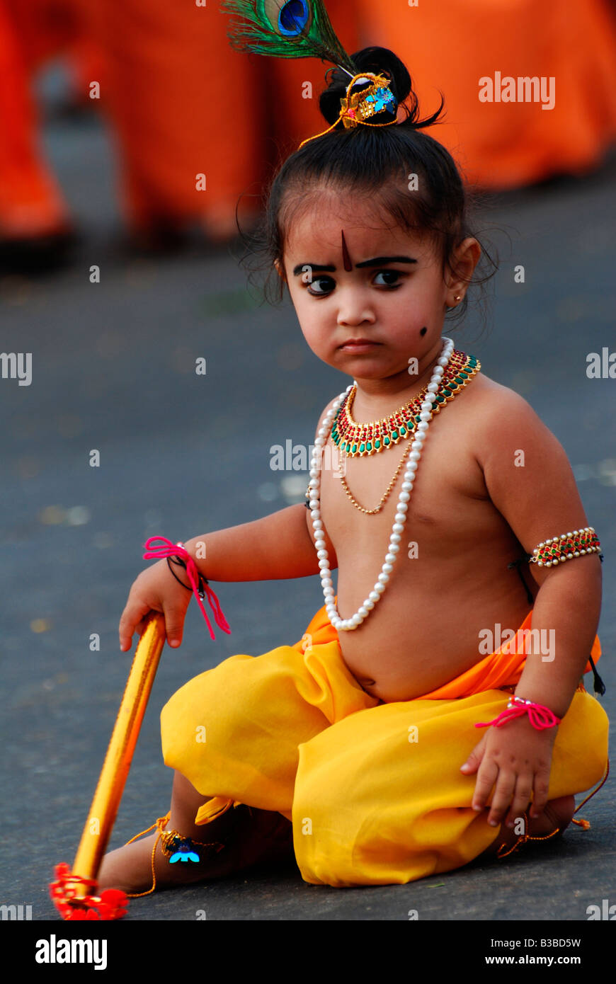 Little Krishna- a small boy posing as lord krishna in a ...