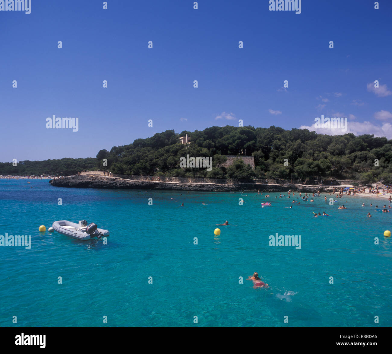 Scene in Cala Mondrago Natural Park with Playa / ( beach ) + boats , near Porto Petro / Cala D'Or, East Coast Mallorca. Stock Photo