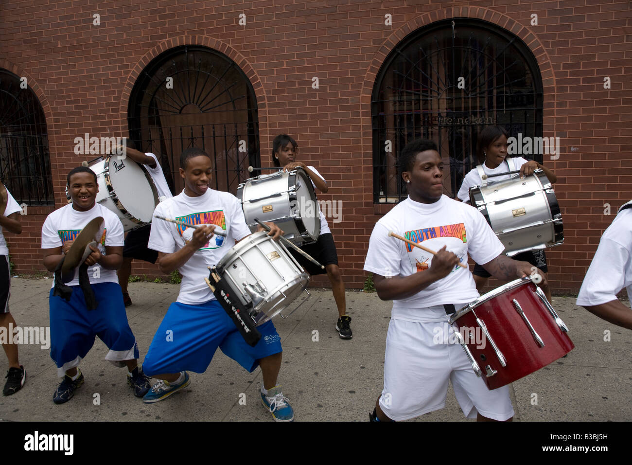 Youth Alive percussion marching band get ready to march at the Brooklyn Queens Day parade in Brooklyn New York Stock Photo