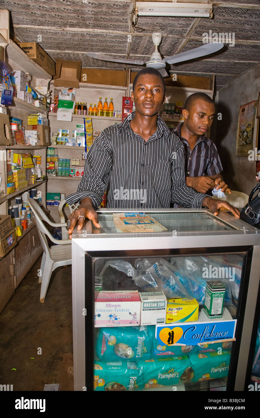 A cabinet window in a shop in Obollo-Afor, Nigeria displays a sticker advertising Confidence oral contraceptives. Stock Photo