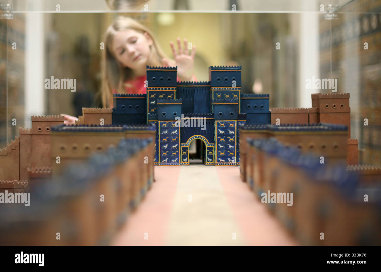 Young visitor looking at a scale model of The Ishtar Gate in the Pergamon Museum in Berlin, Germany Stock Photo