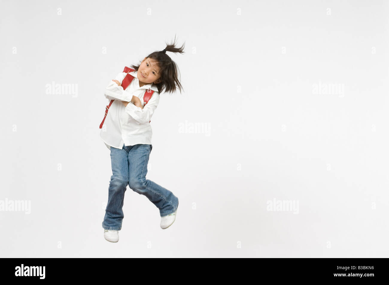 Black and white girl jumping hi-res stock photography and images - Alamy