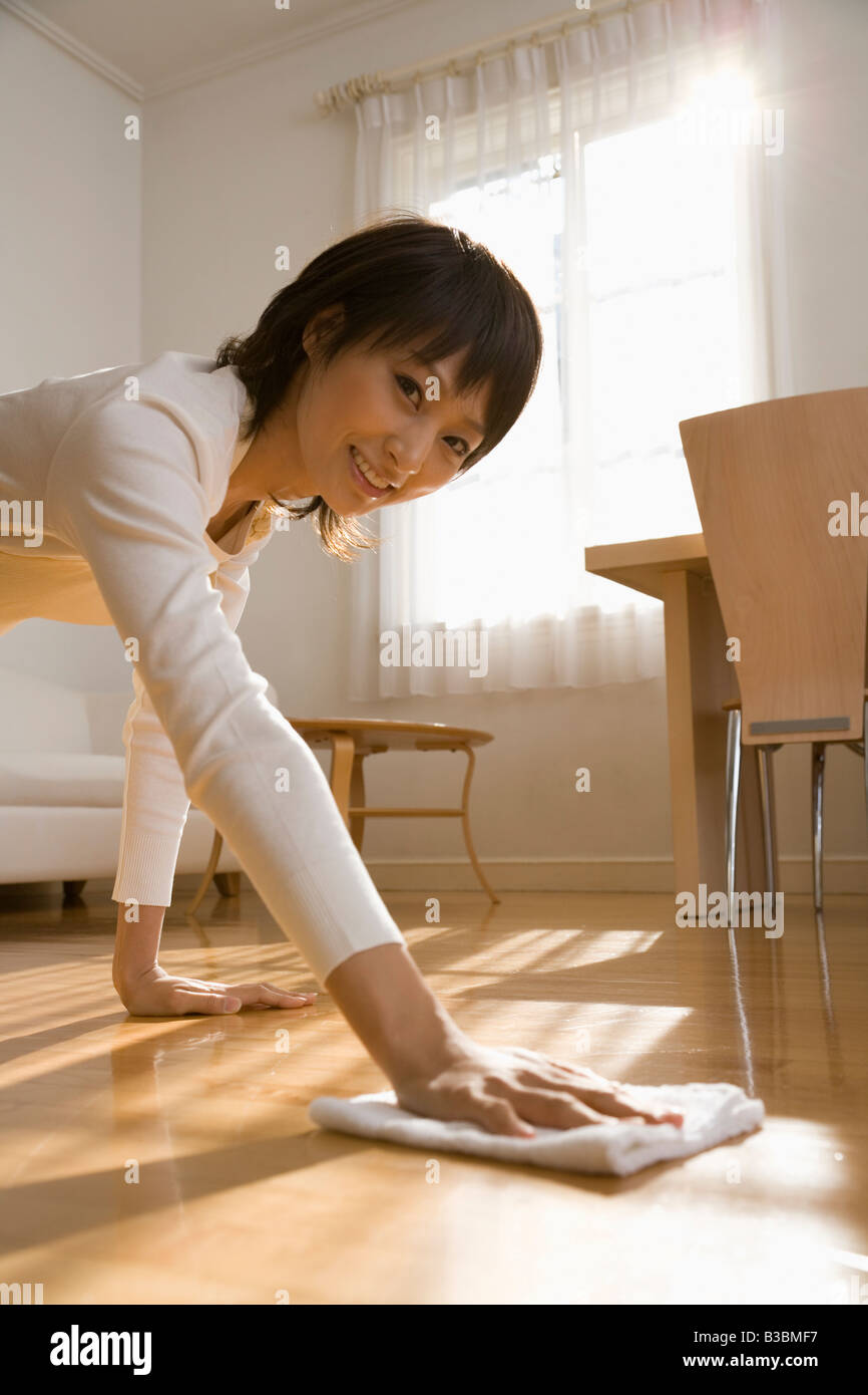 Housewife wiping floor Stock Photo Alamy