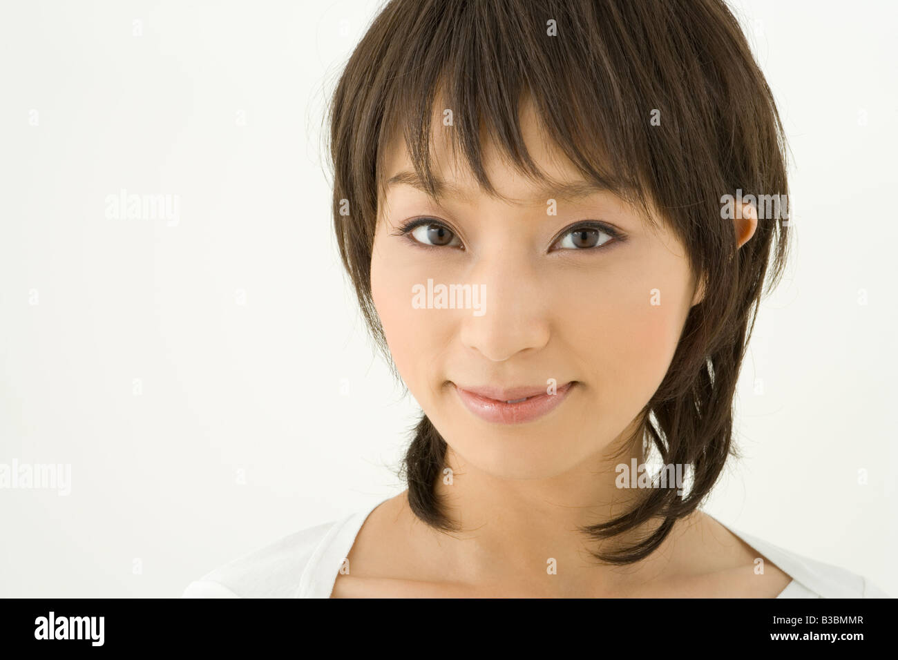 Portrait of smiling woman hi-res stock photography and images - Alamy