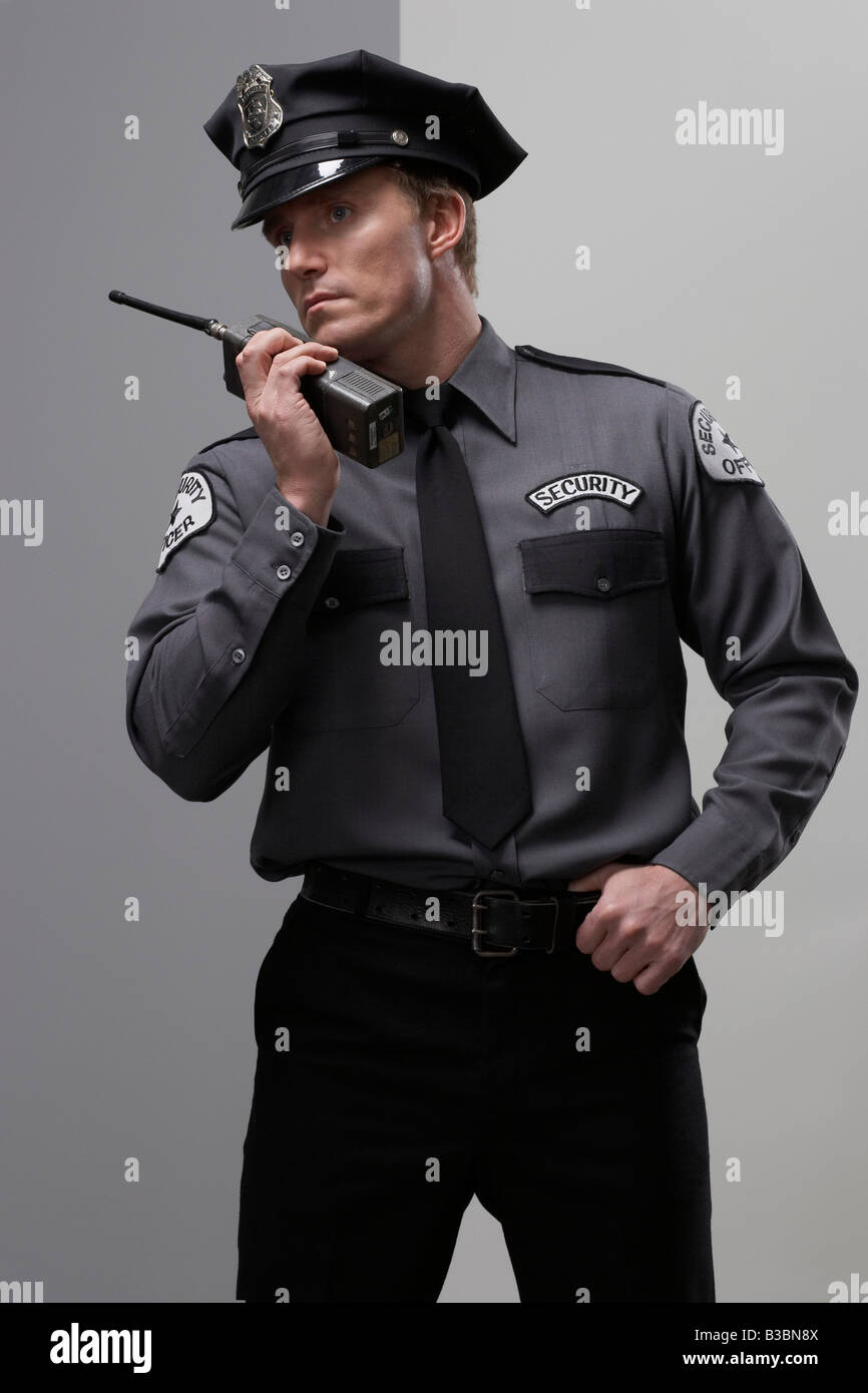 Security Guard using Walkie Talkie Stock Photo Alamy