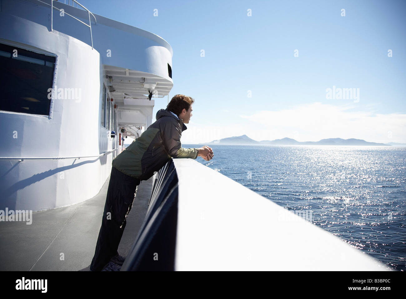 Man on Ferry, Prince William Sound, Alaska, USA Stock Photo