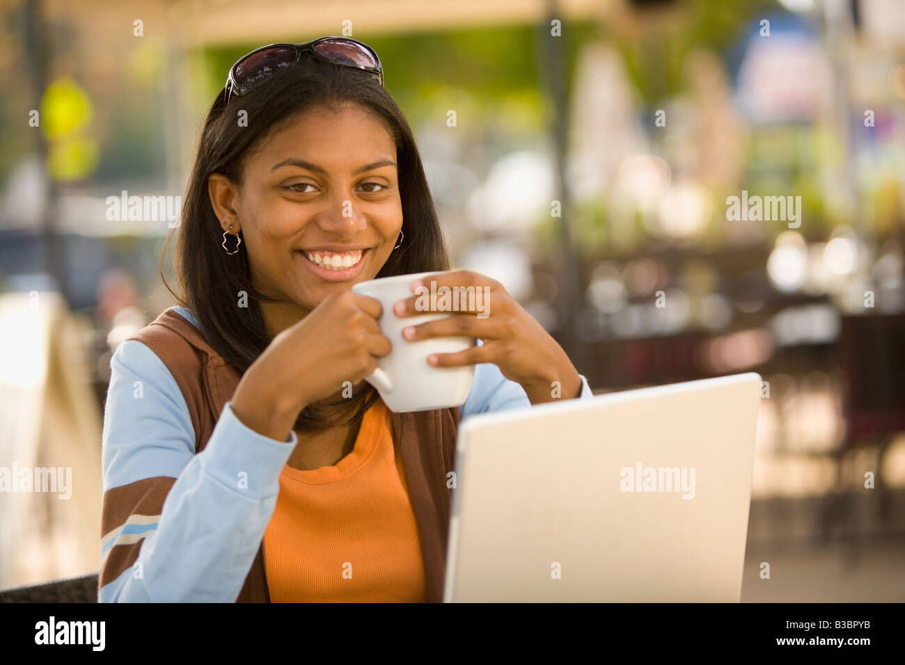 African woman drinking coffee Stock Photo - Alamy