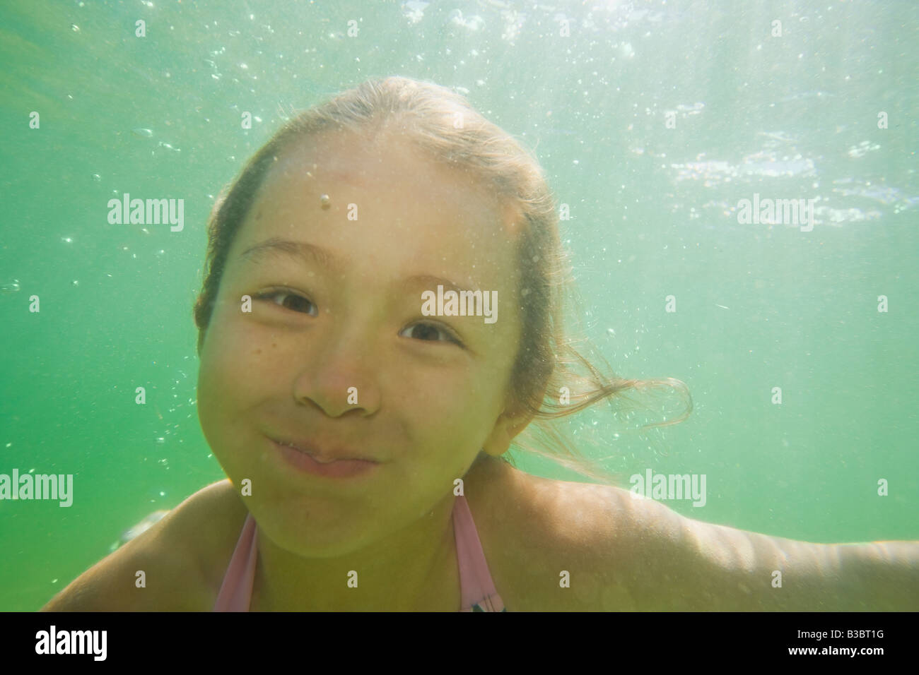 Asian girl swimming in lake Stock Photo Alamy