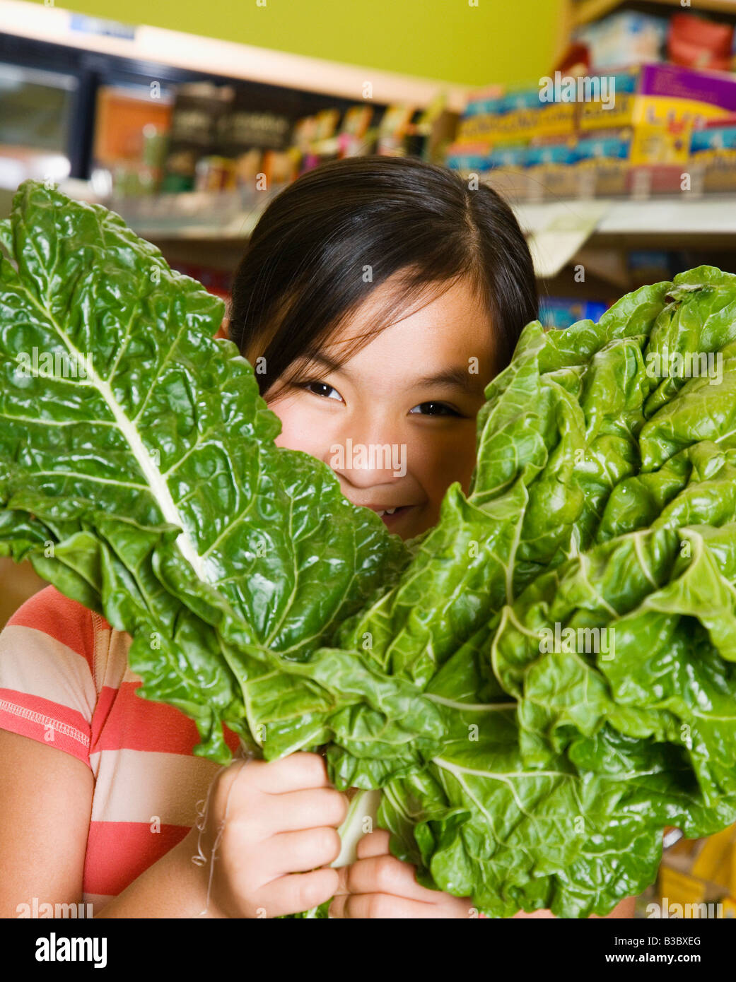 Girl 10 11 years holding leaf hi-res stock photography and images - Alamy