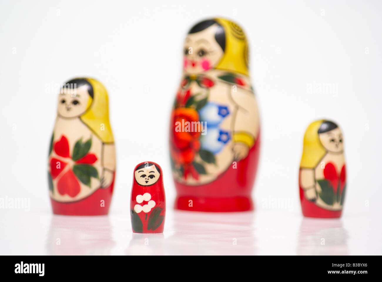 Wooden russian dolls representing an unhappy family concept Stock Photo