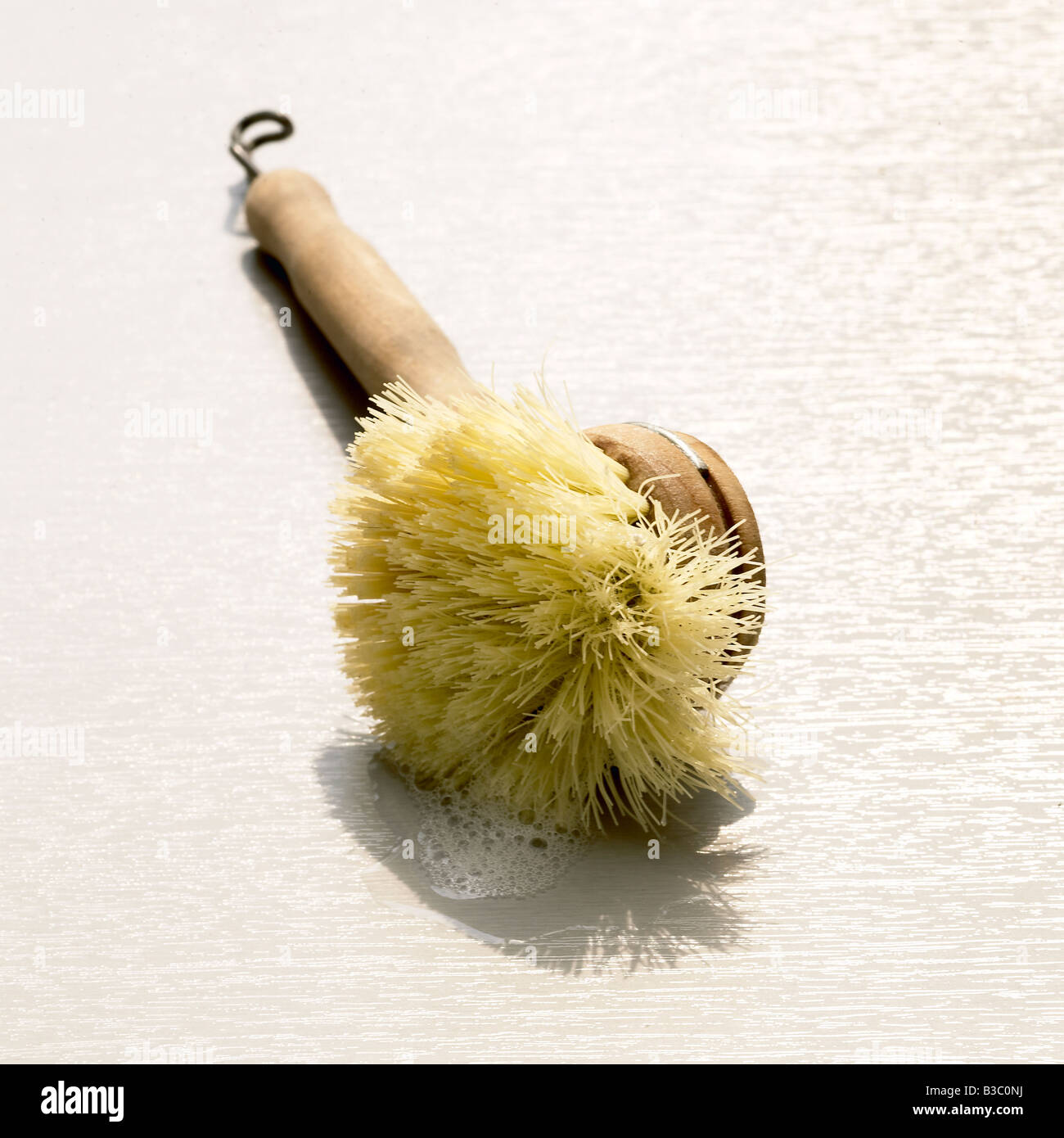A wooden scrubbing brush Stock Photo Alamy