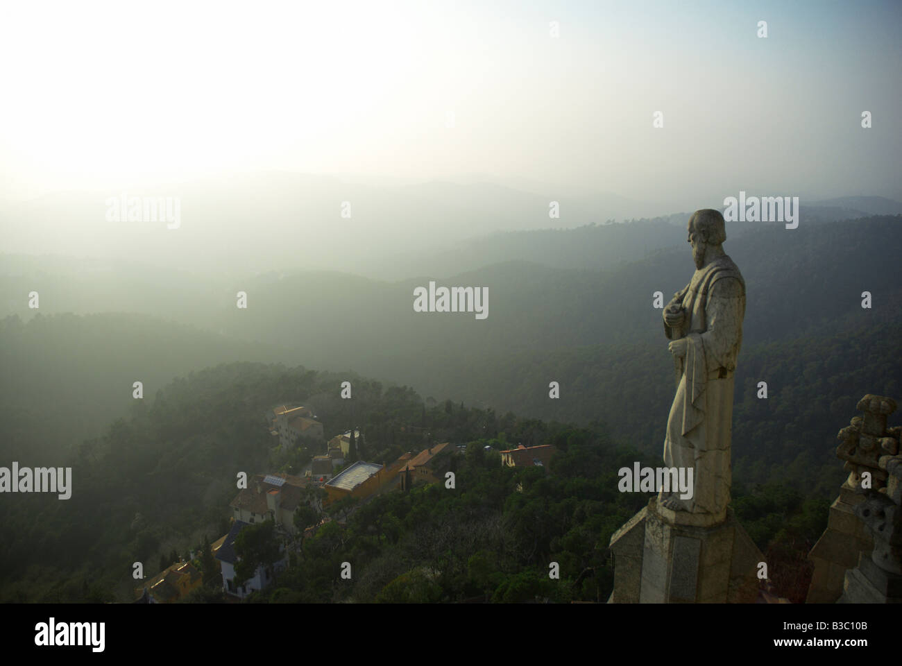 View over the statues of the Sagrat Cor sanctuary on the Tibidabo hill and the Torre de Collserola, Barcelona, Catalonia, Spain Stock Photo