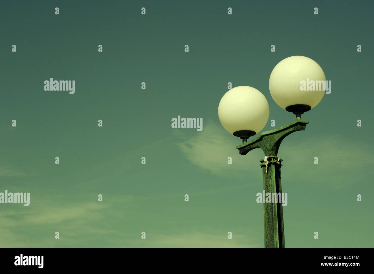 Cross processed view of street lights Stock Photo Alamy