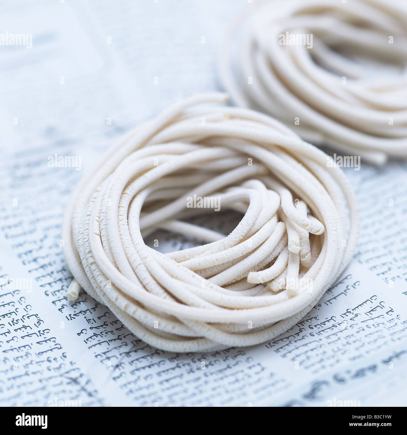 Hand made pasta rolled in circles Stock Photo Alamy