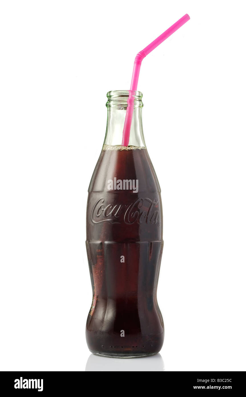 Fresh classic Coca Cola bottle with pink plastic straw isolated on white background Stock Photo