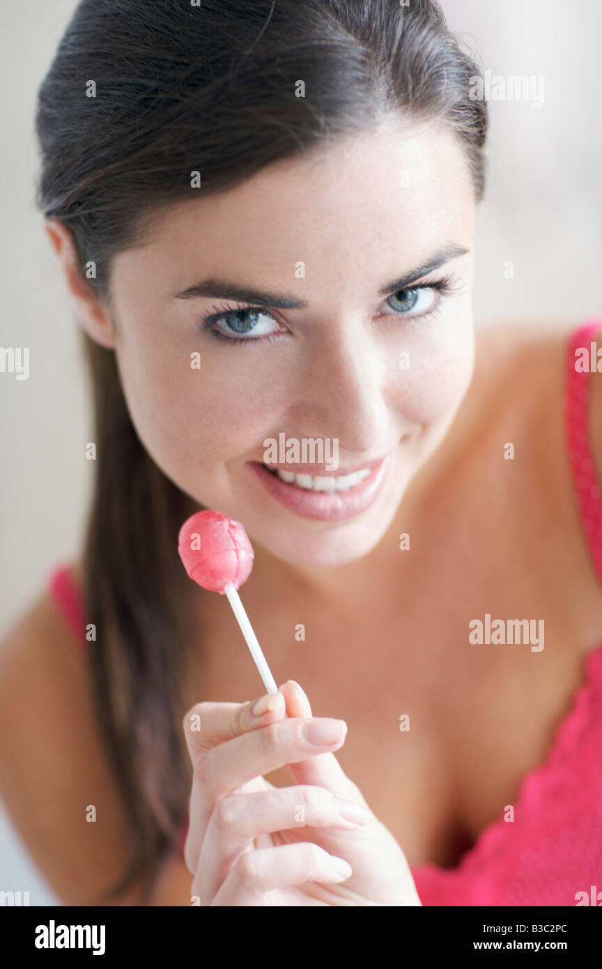 Adult eating lolly pop hi res stock photography and images Alamy