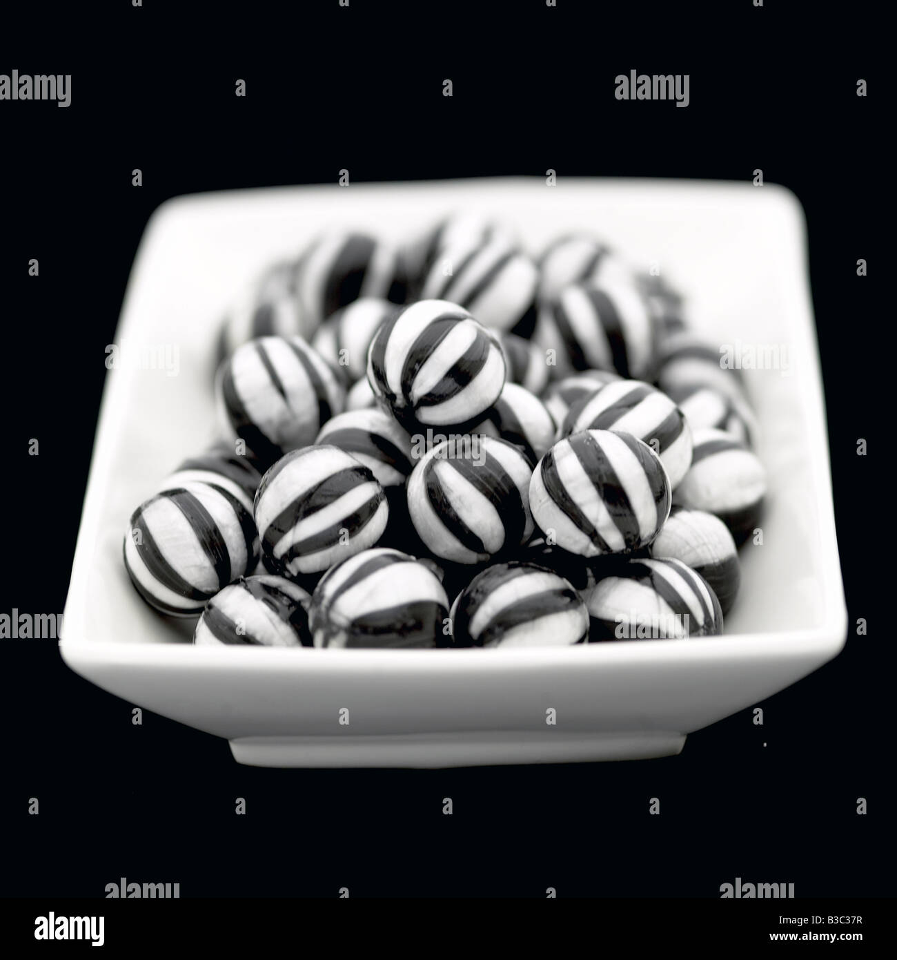 Humbug sweets in a bowl Stock Photo