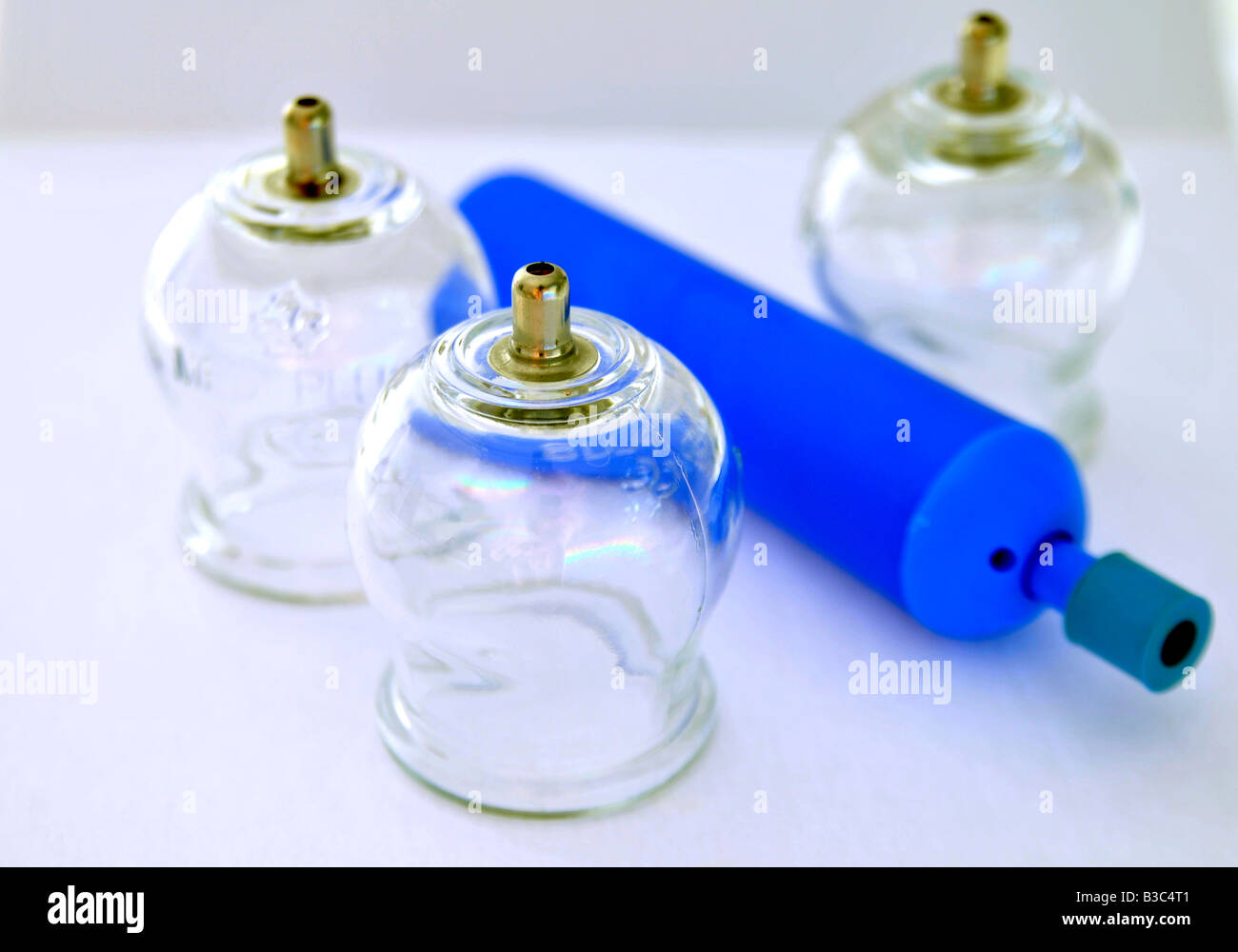 Suction cup glass jars with vacuum pump for alternative medicine Stock